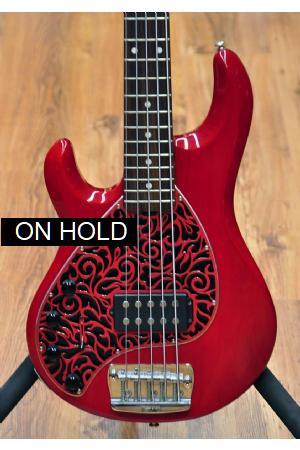 Music Man Stingray 5 Trans Red Left handed (used) Music Man Stingray 5 Trans Red Left handed (used)